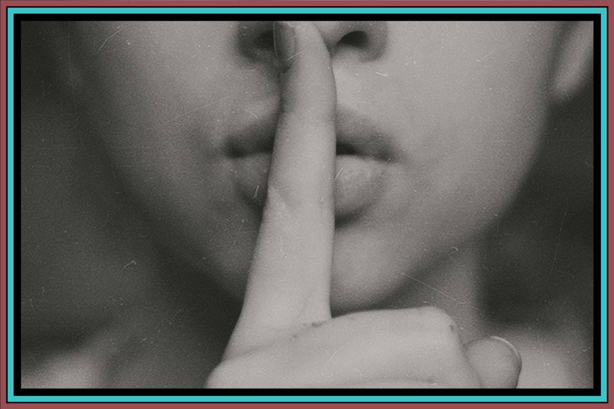 Finger in front of the mouth